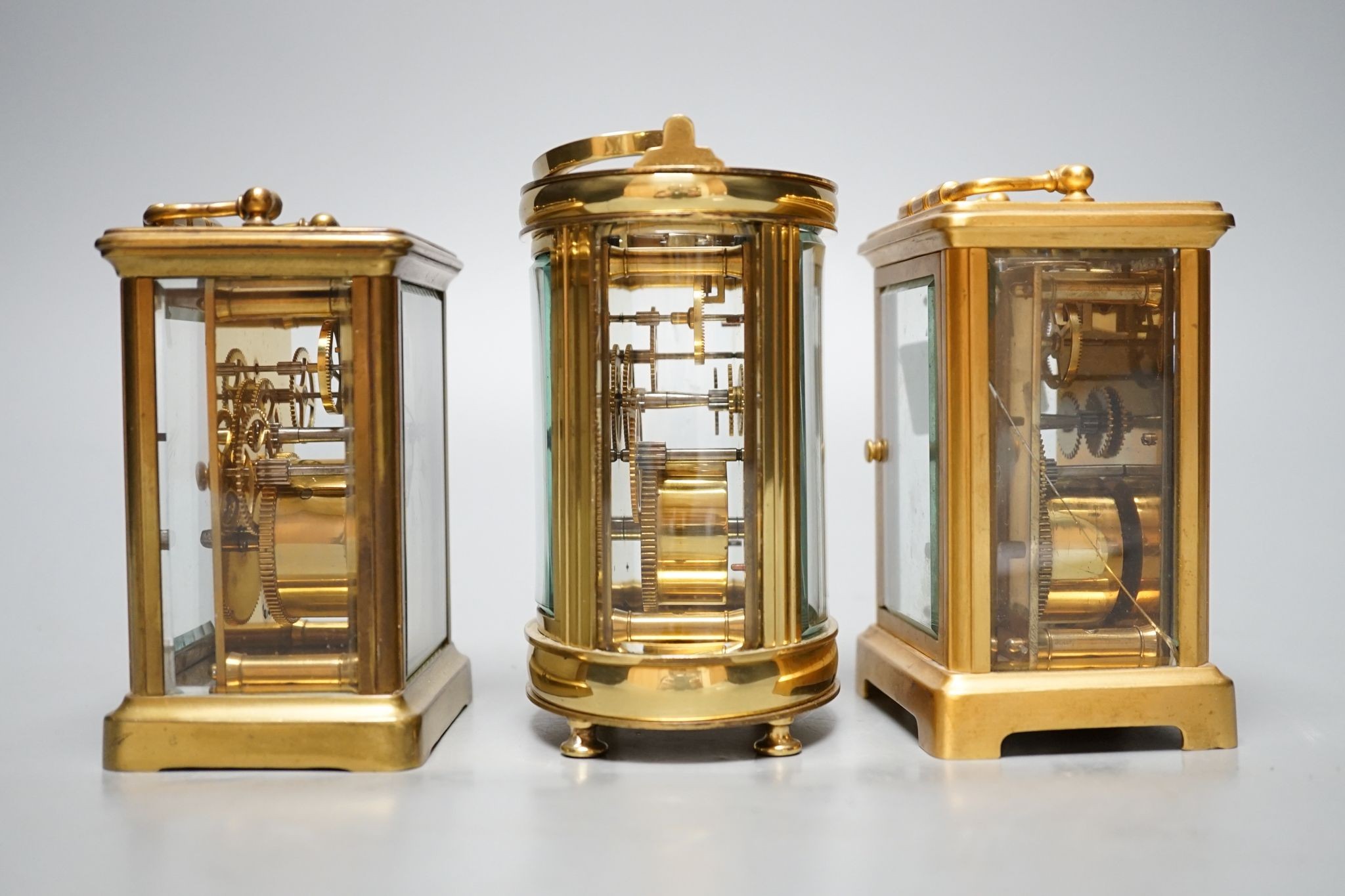 Three carriage timepieces, tallest 12 cm